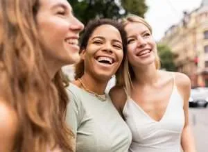 beautiful-female-friends-smiling-being-happy