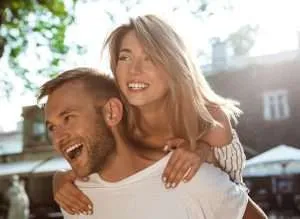 young-beautiful-couple-smiling-embracing-walking-park